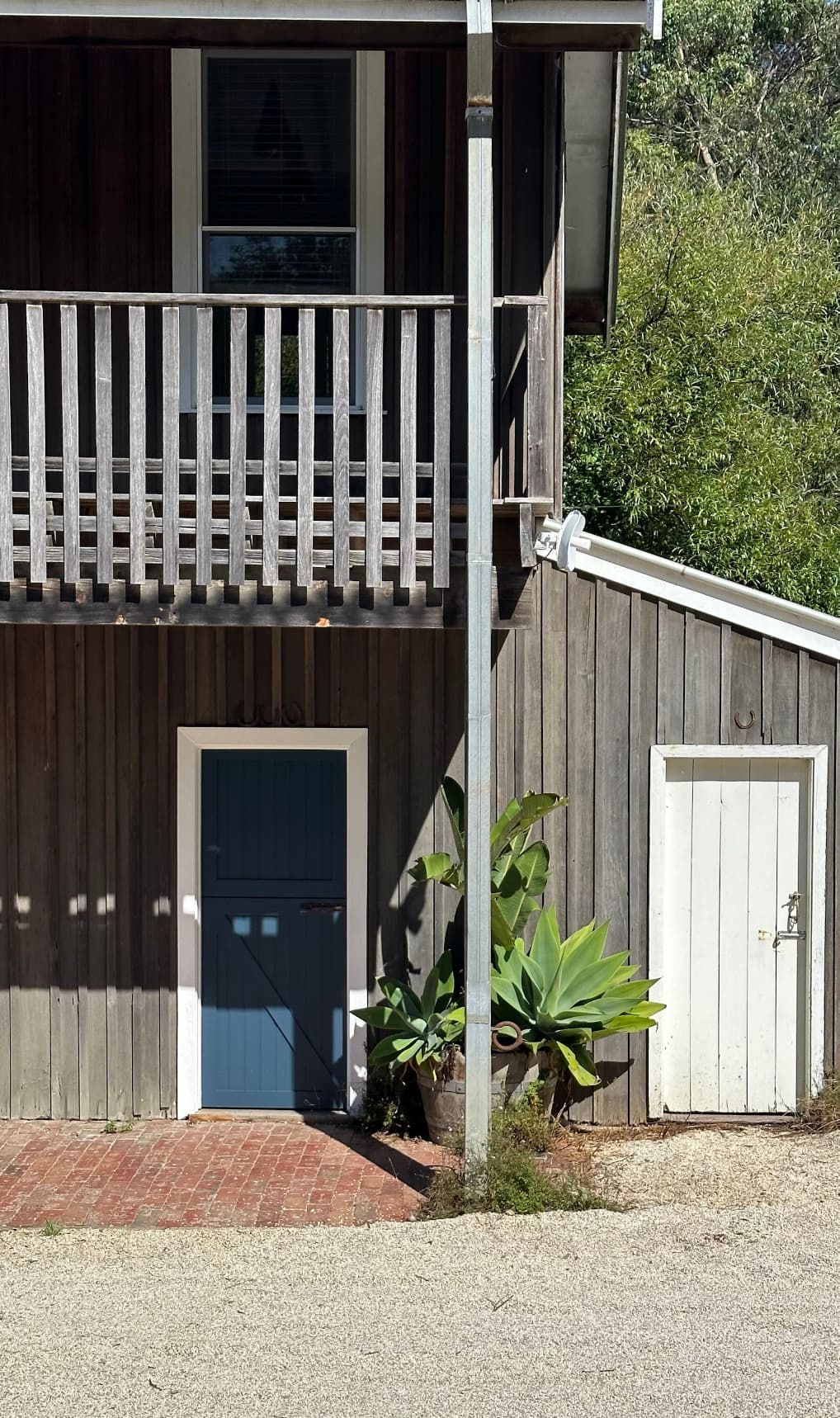 Timber cladding with freshly painted doors